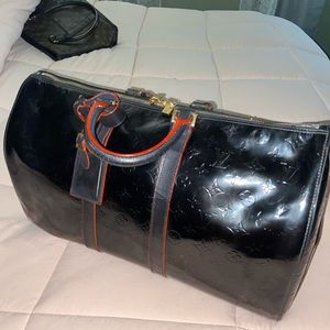 Louis Vuitton Vernis black Mercer duffle